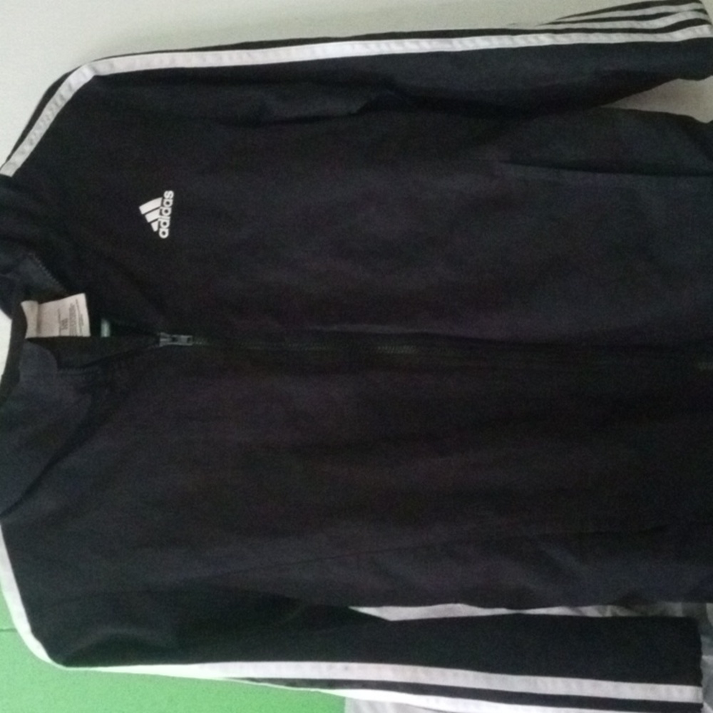 Adidas youth hooded windbreaker sz. LG 14. Black